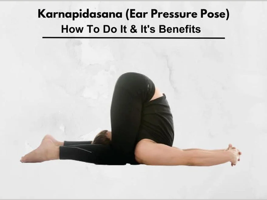 Ear Pressure Pose (Karnapidasana) — photograph
