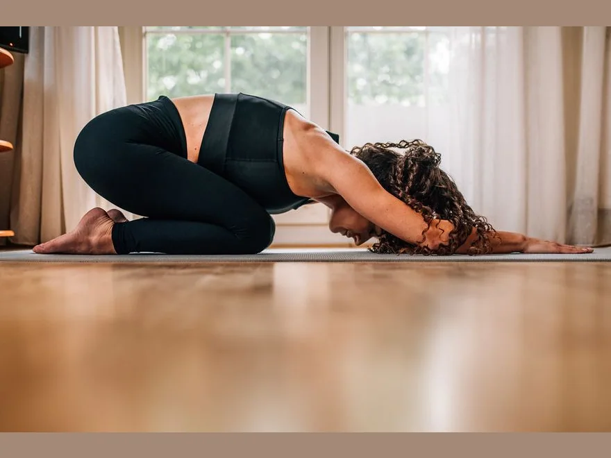 Extended Puppy Pose (Uttana Shishosana) — photograph