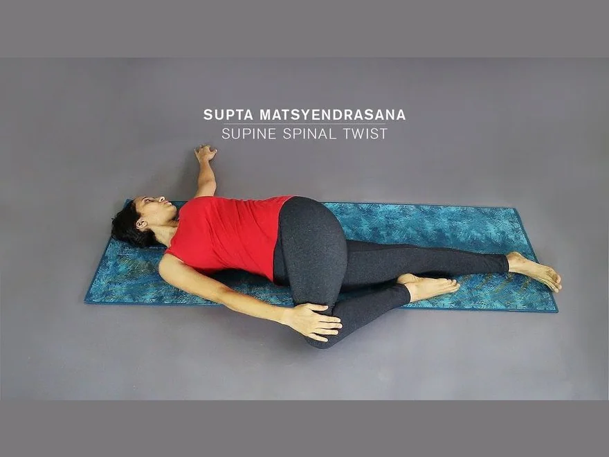 Reclined Spinal Twist (Supta Matsyendrasana) — photograph